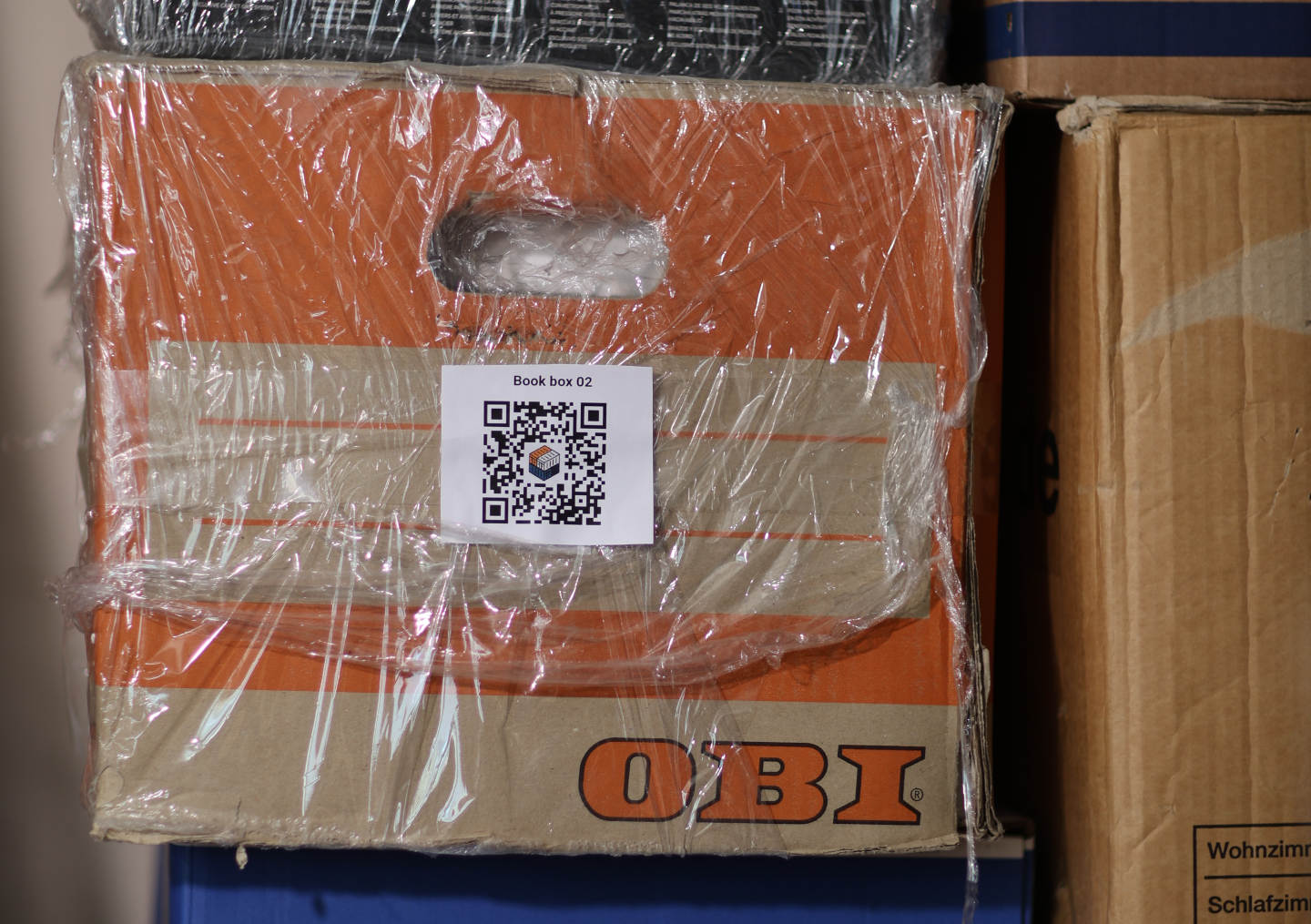 Close-up of a QR label on a real storage box